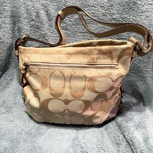 Tan coach monogram canvas purse